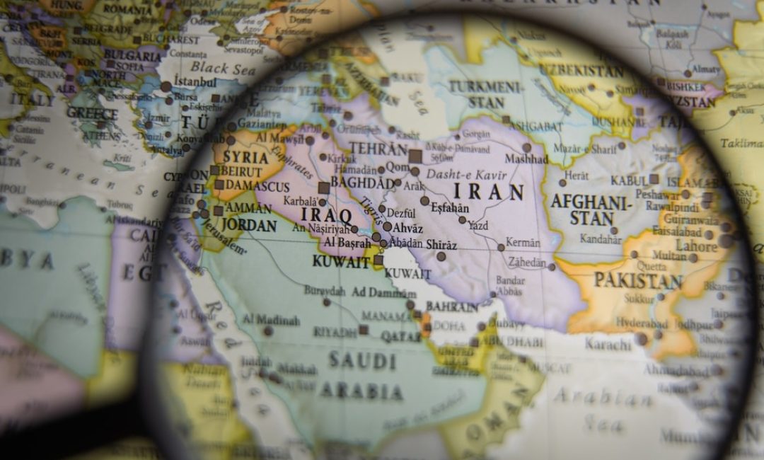 Magnifying,Glass,Over,A,Geographical,Map,Of,The,Middle,East