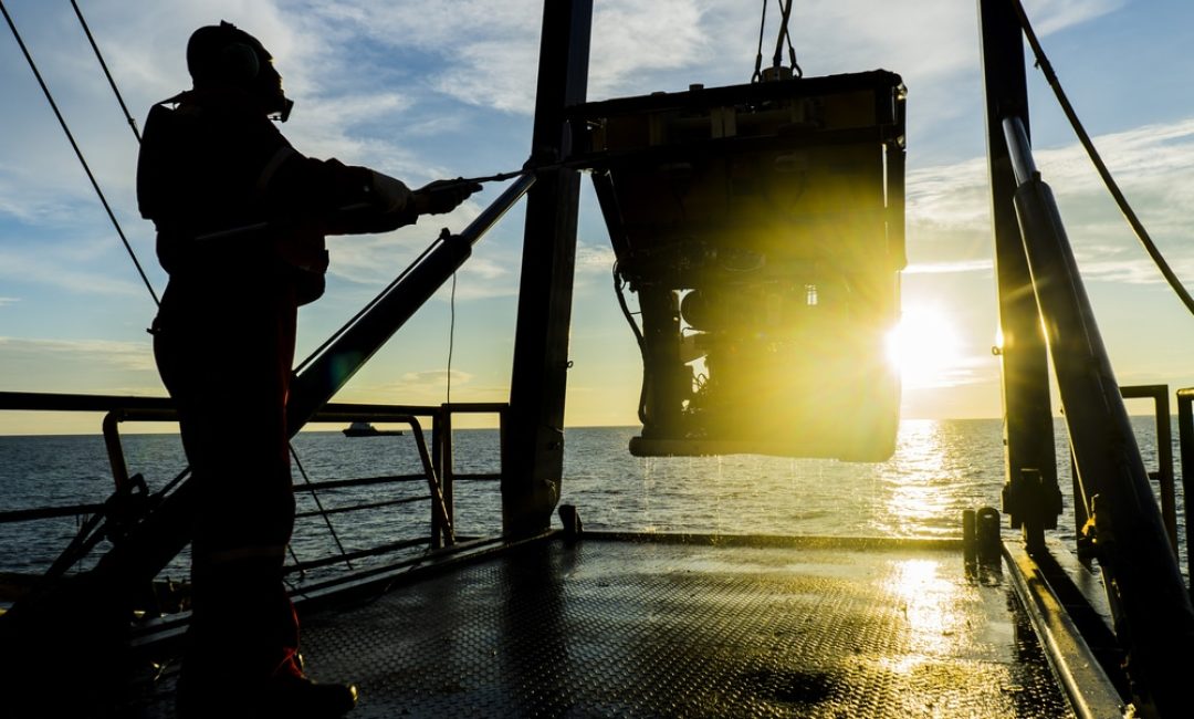 Silhouette,Of,Worker,Recovering,Robotics,Remote,Operated,Vehicle,(rov),After